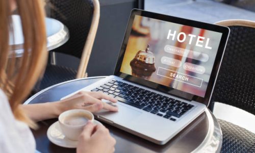 hotel-booking booking hotel on internet, travel planning, online reservation concept, woman looking at screen of computer searching accommodation